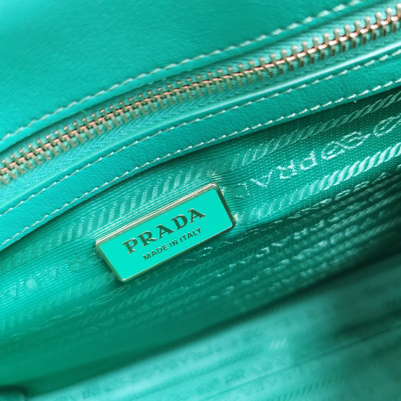 Pra*a symbole small bag in green and white jacquard fabric