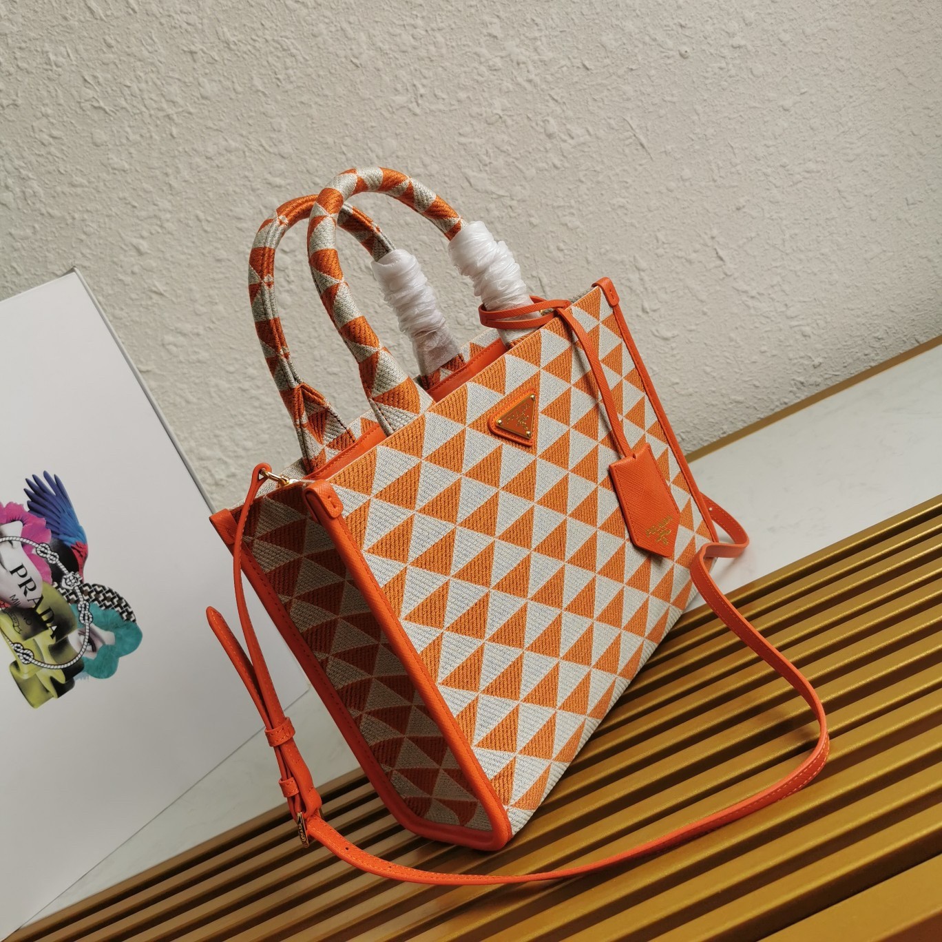 Pra*a symbole small bag in orange and white jacquard fabric