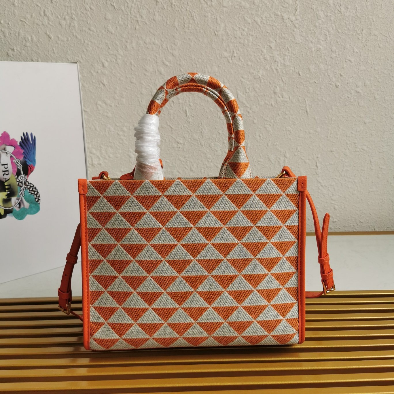 Pra*a symbole small bag in orange and white jacquard fabric