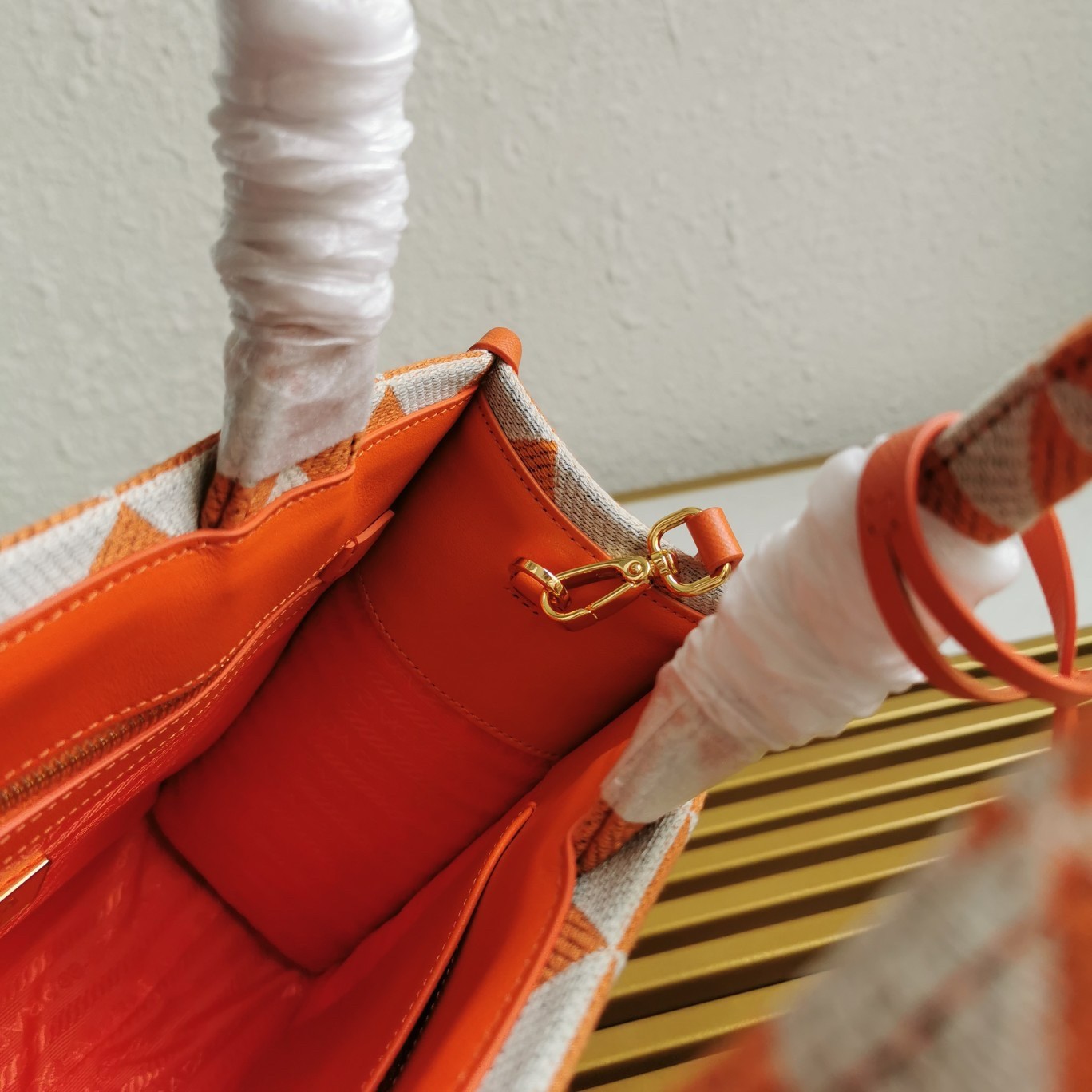 Pra*a symbole small bag in orange and white jacquard fabric
