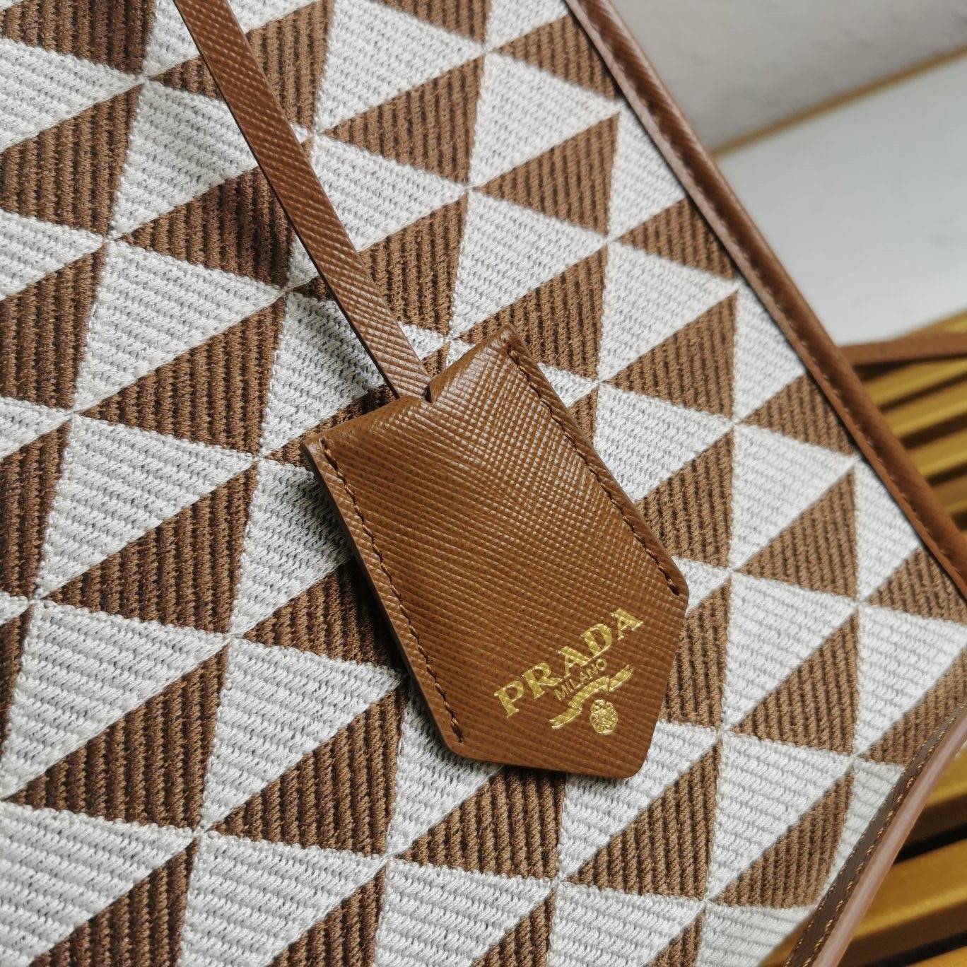 Pra*a symbole small bag in white/brown jjacquard fabric