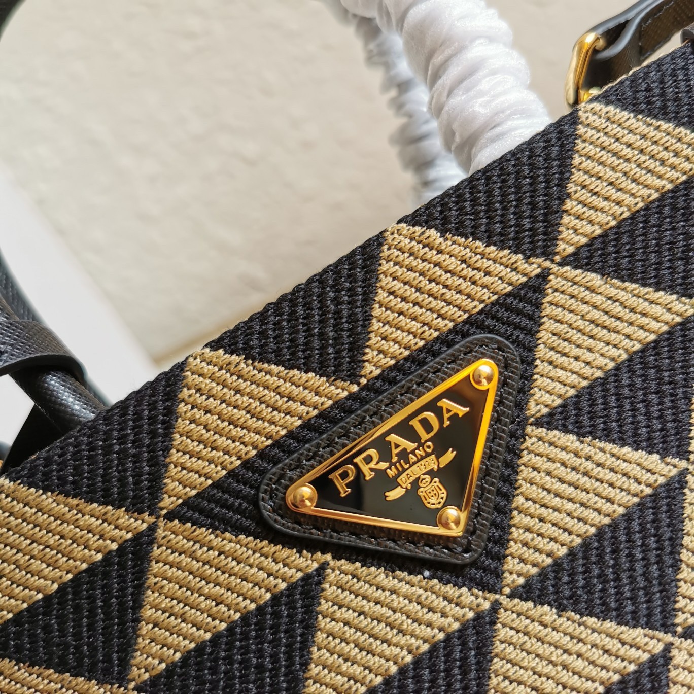 Pra*a symbole micro bag in black/beige jjacquard fabric