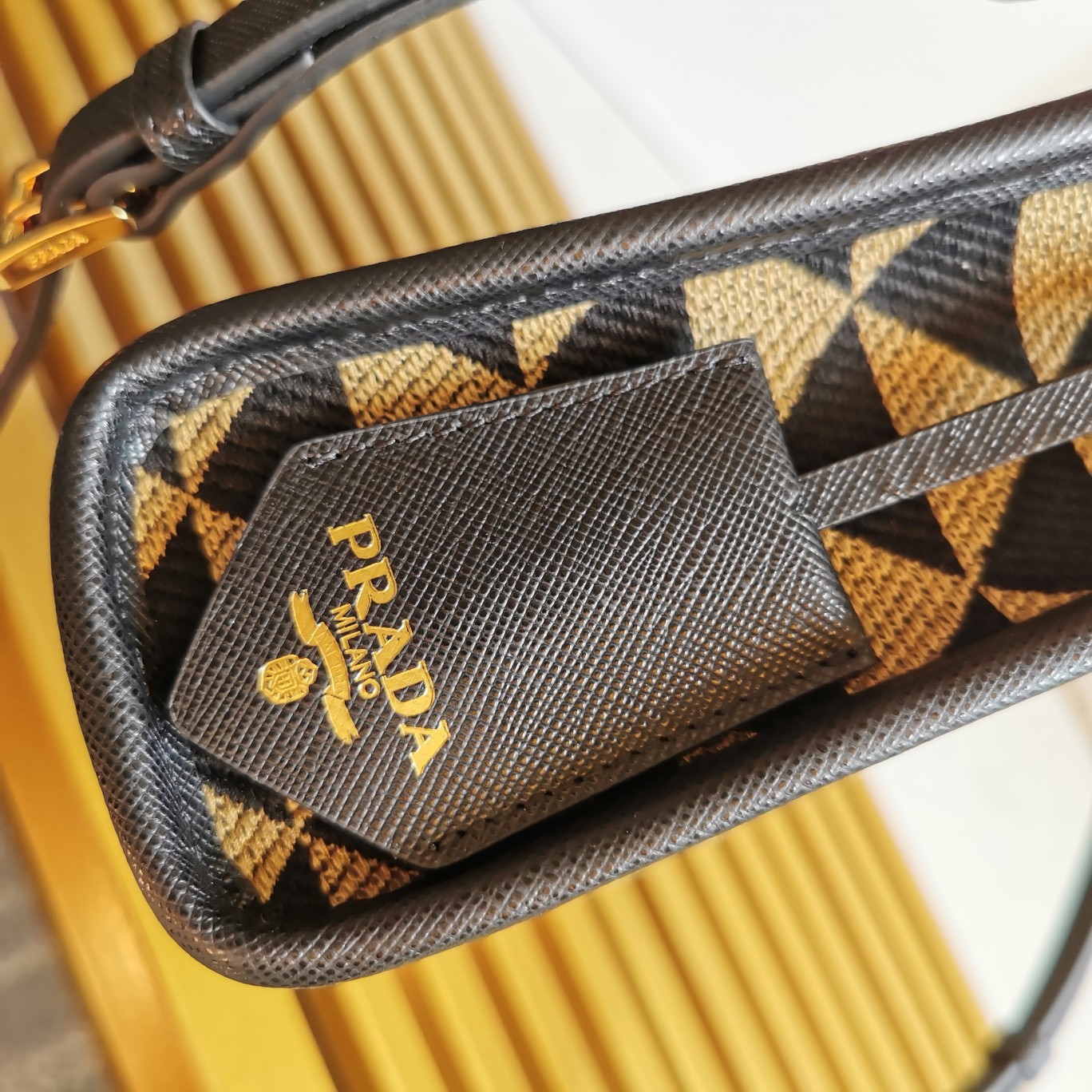 Pra*a symbole micro bag in black/beige jjacquard fabric