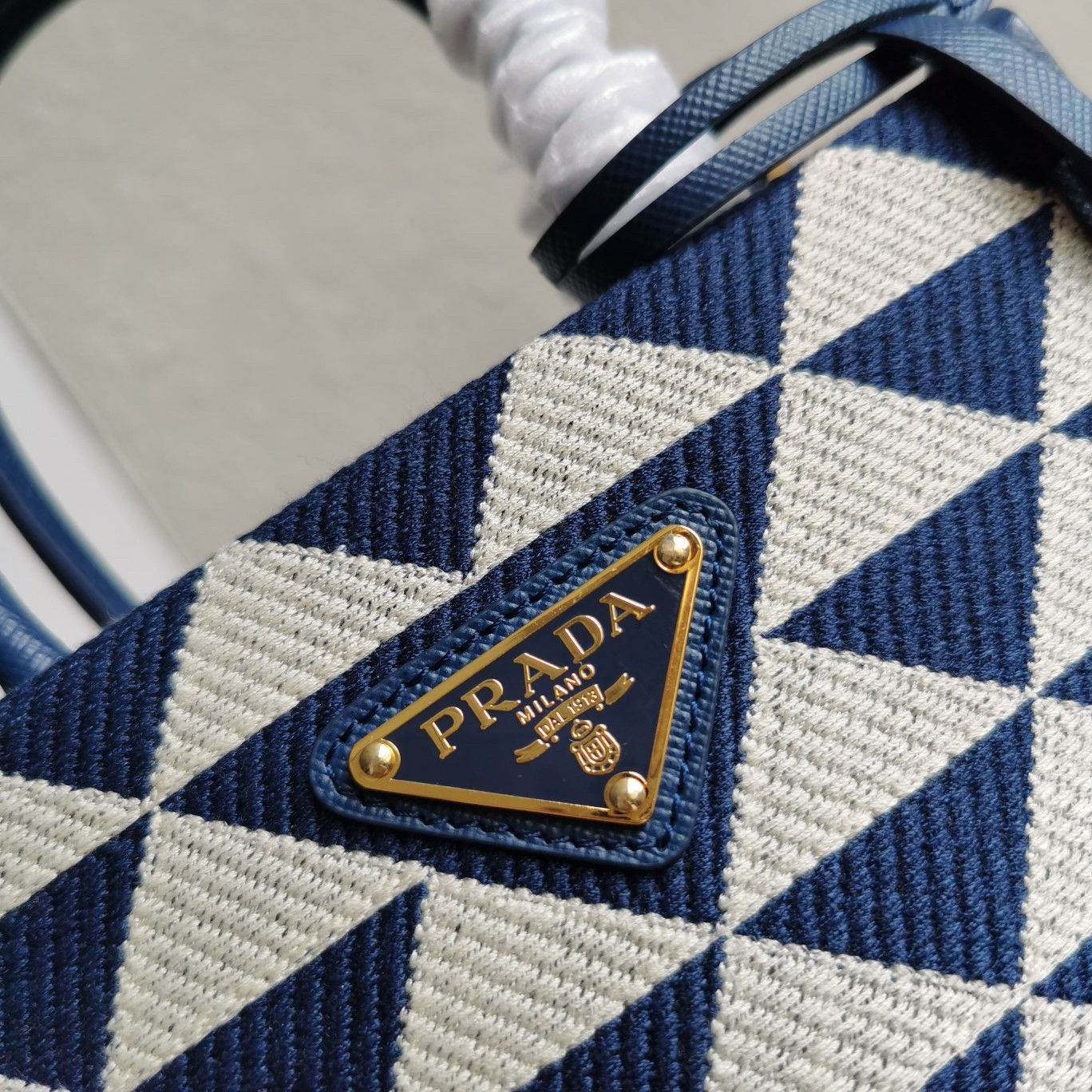 Pra*a symbole micro bag in white/blue jjacquard fabric