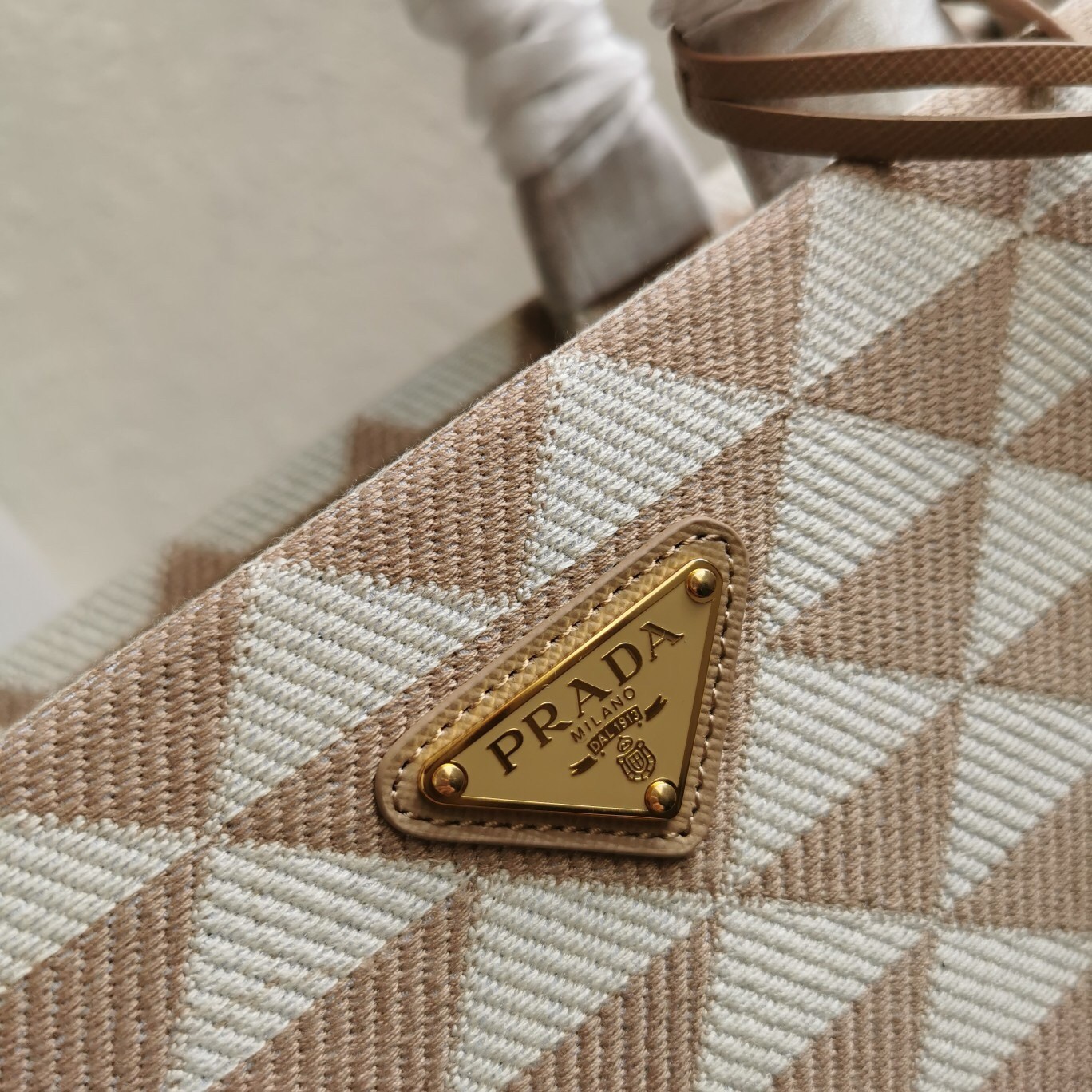 Pra*a symbole large bag in beige and white jacquard fabric