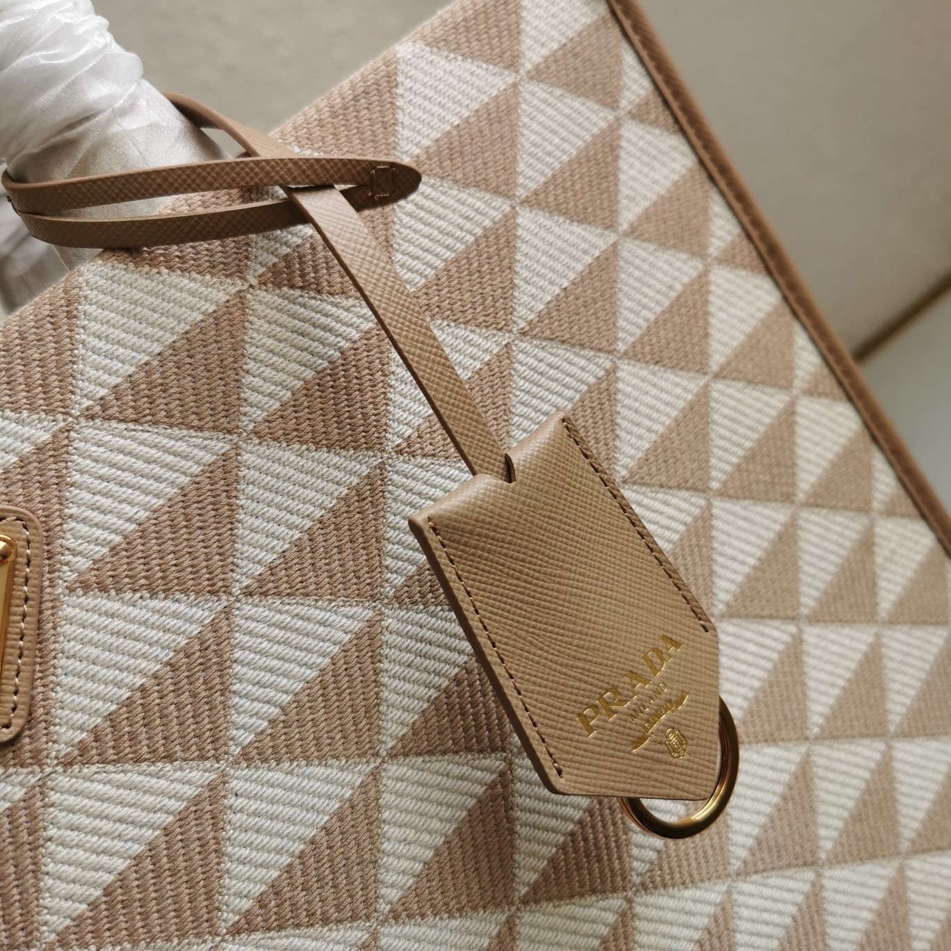 Pra*a symbole large bag in beige and white jacquard fabric