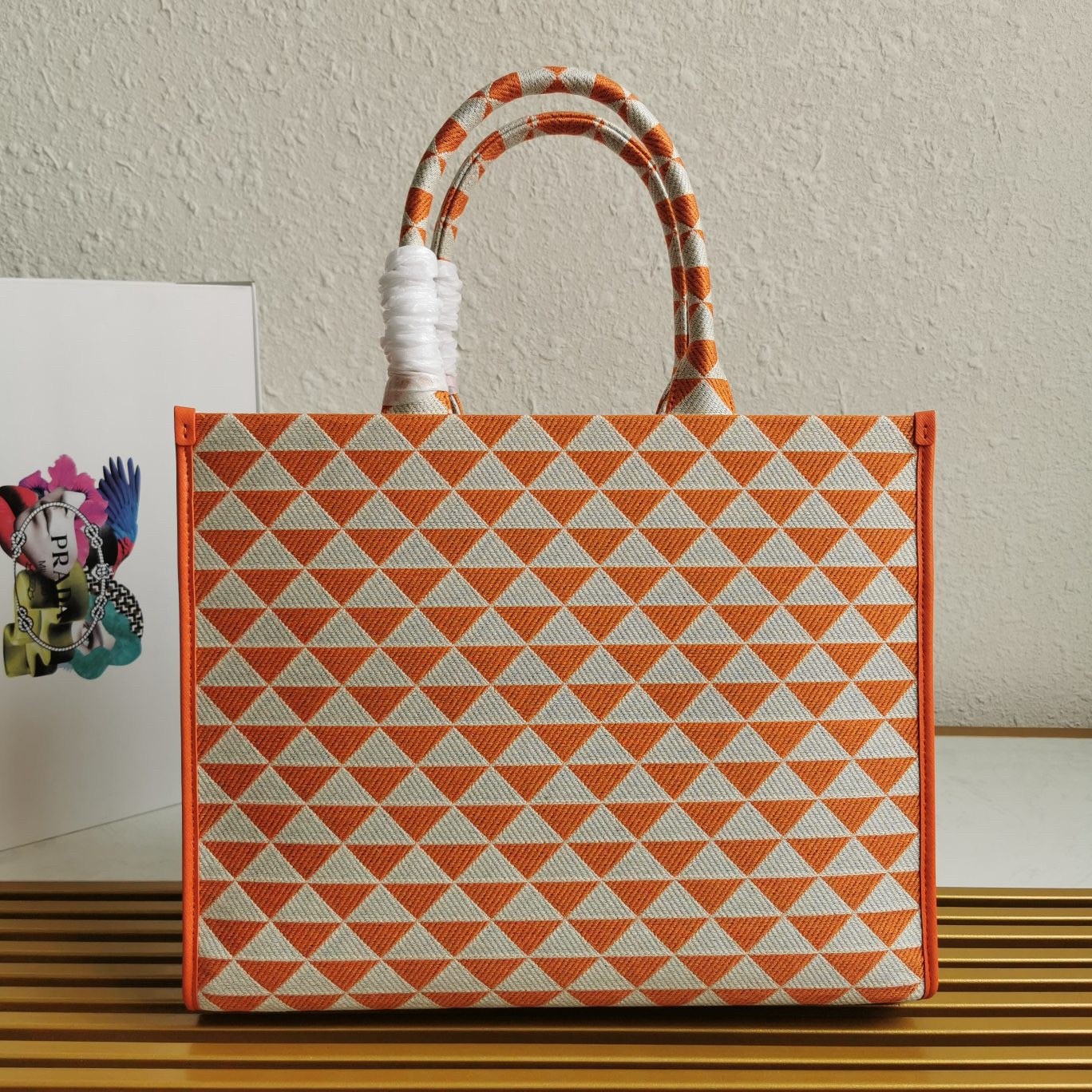 Pra*a symbole large bag in orange and white jacquard fabric