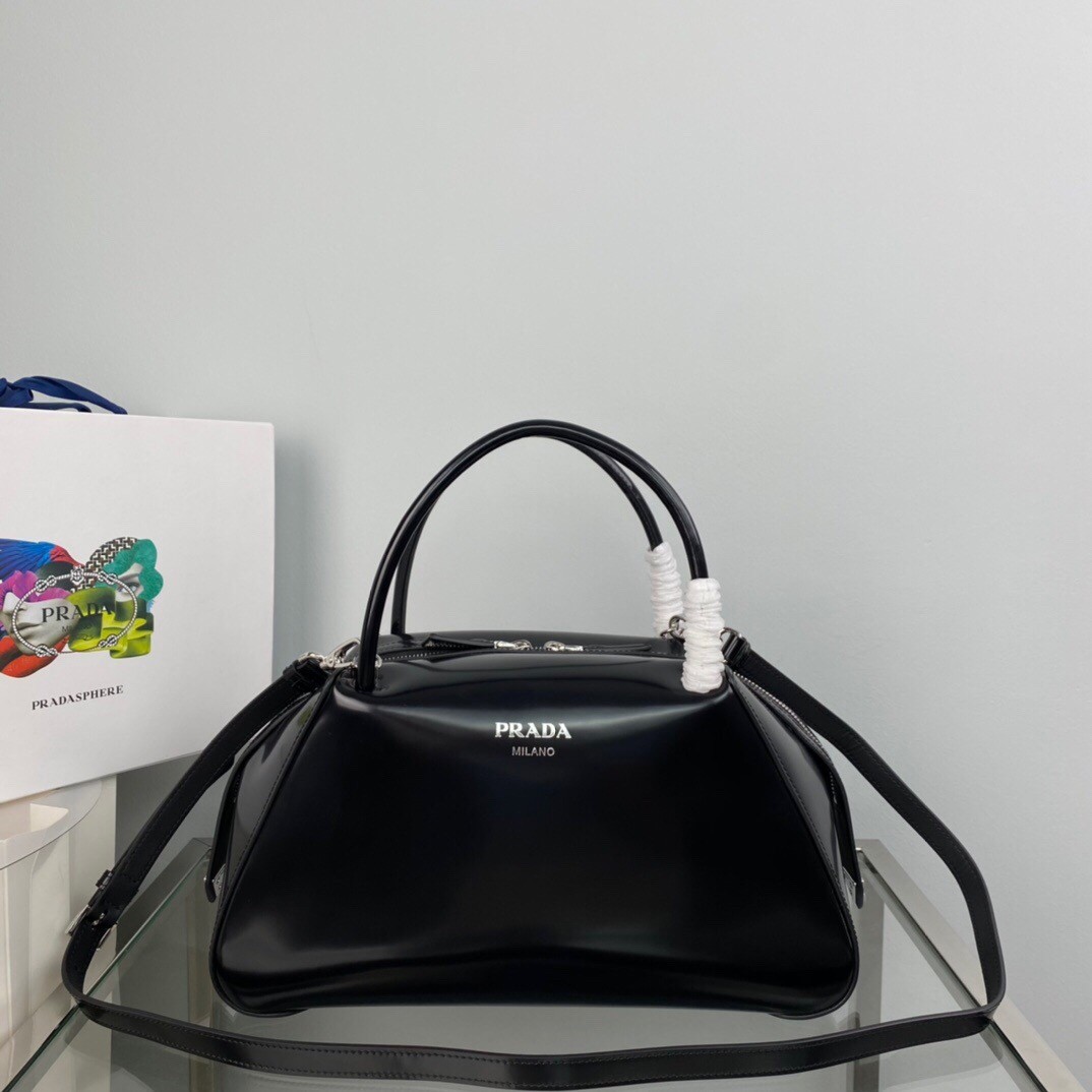 pra*a S*pernova medium handbag in black brushed leather