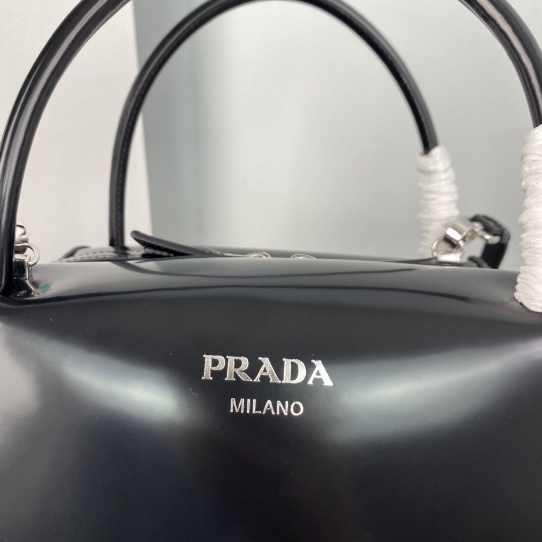 pra*a S*pernova medium handbag in black brushed leather