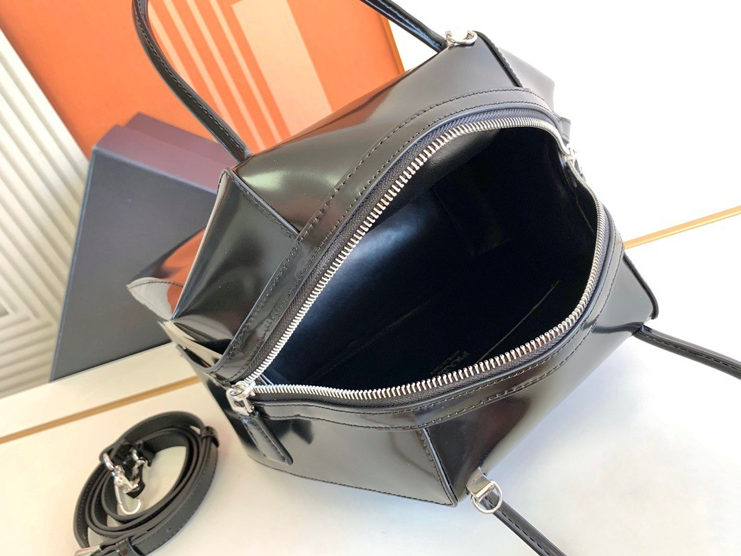 pra*a S*pernova small handbag in black brushed leather