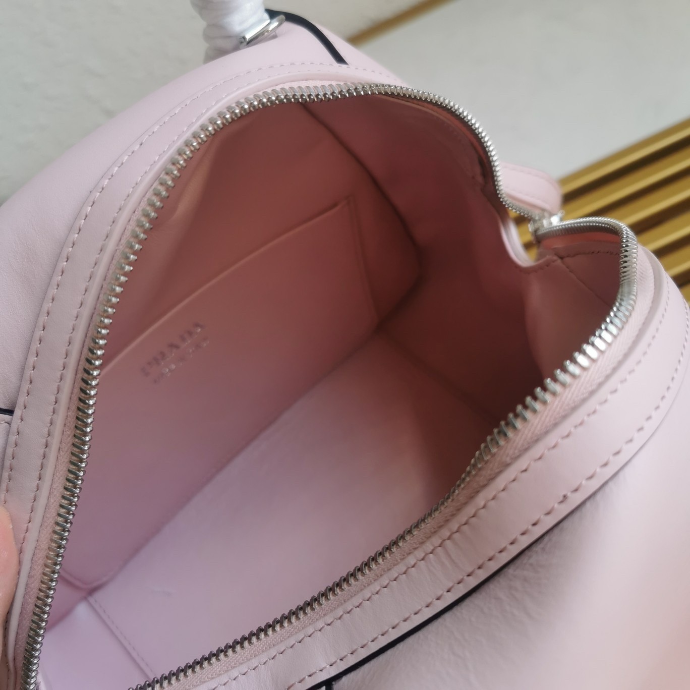 pra*a S*pernova small handbag in pink leather