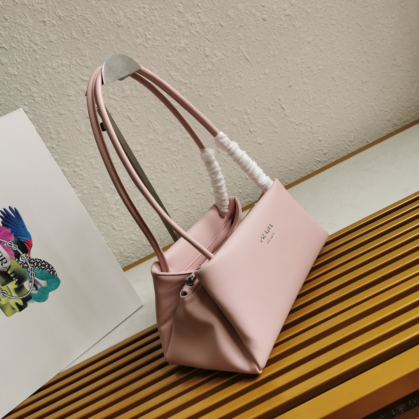 pra*a S*pernova small shoulder bag in pink leather