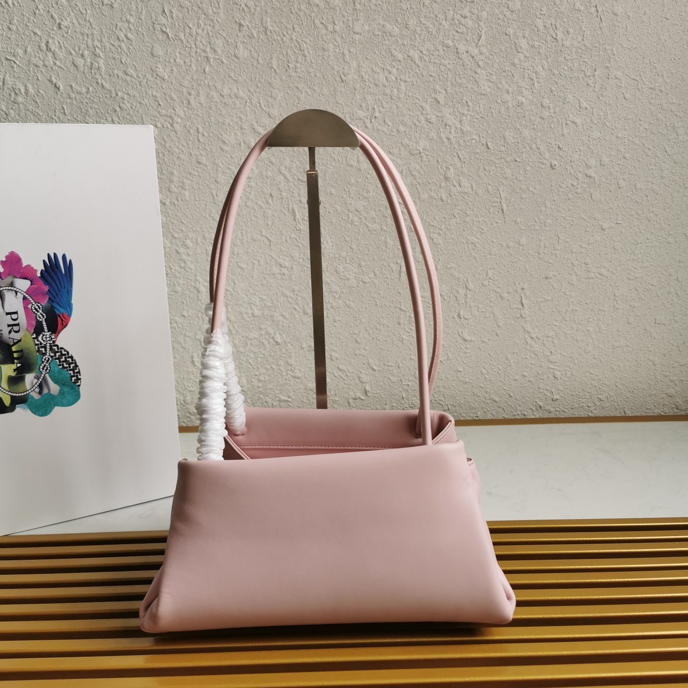 pra*a S*pernova small shoulder bag in pink leather