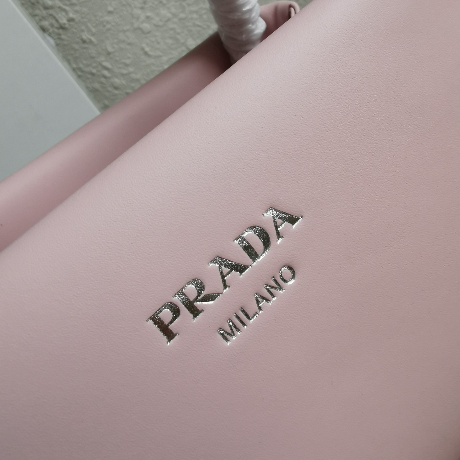 pra*a S*pernova small shoulder bag in pink leather
