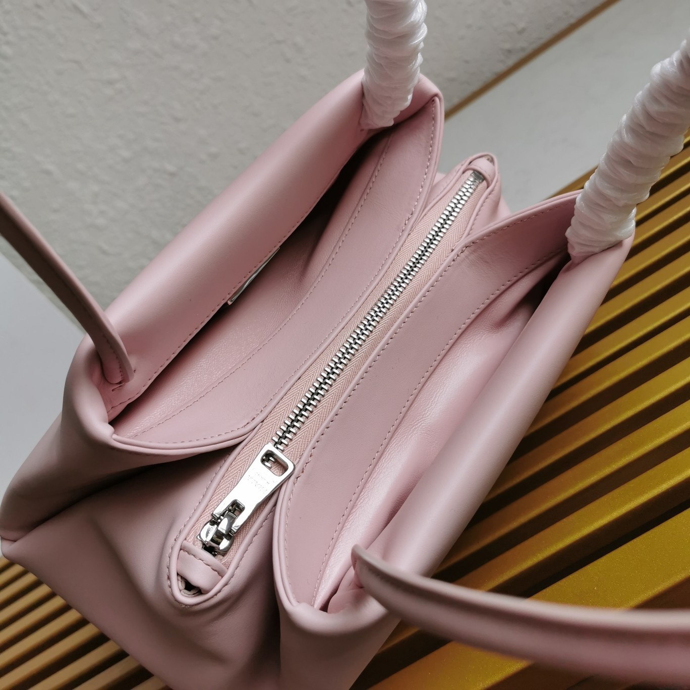 pra*a S*pernova small shoulder bag in pink leather