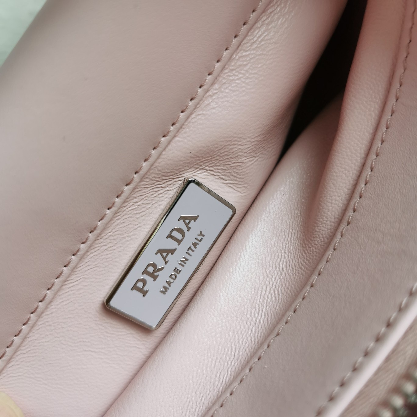pra*a S*pernova small shoulder bag in pink leather