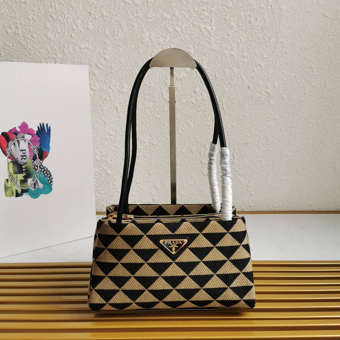 pra*a S*pernova small shoulder bag in black/beige fabric