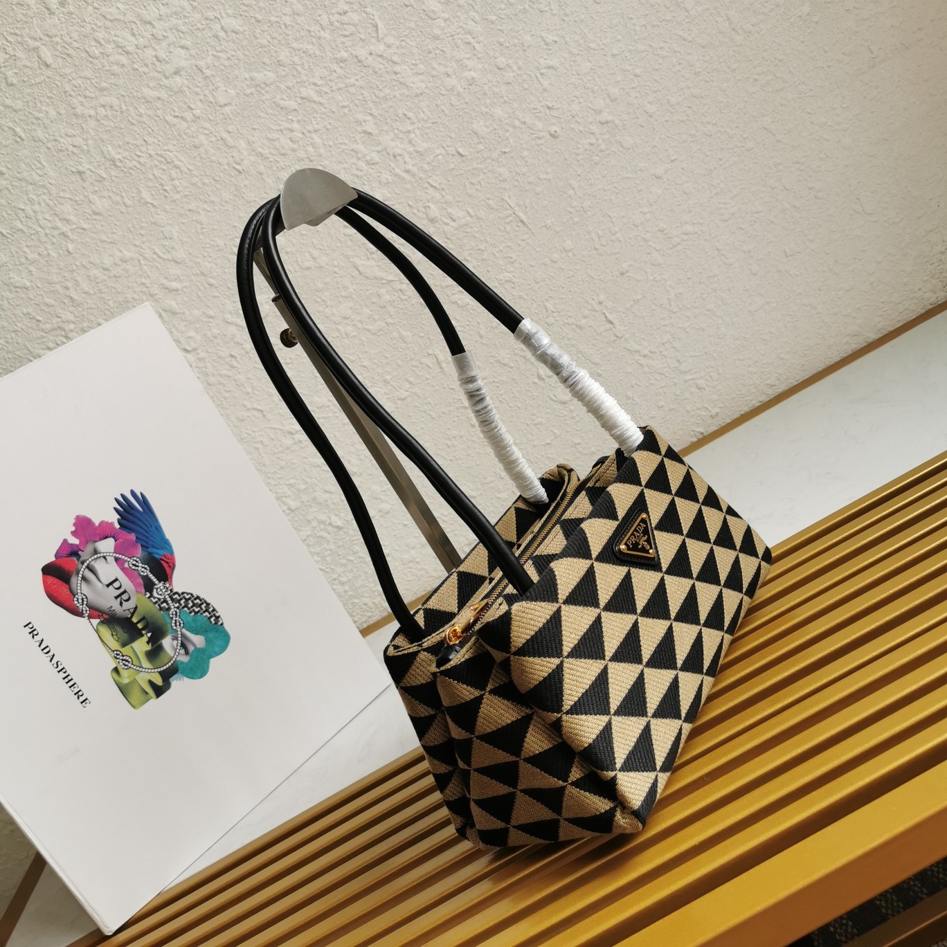 pra*a S*pernova small shoulder bag in black/beige fabric