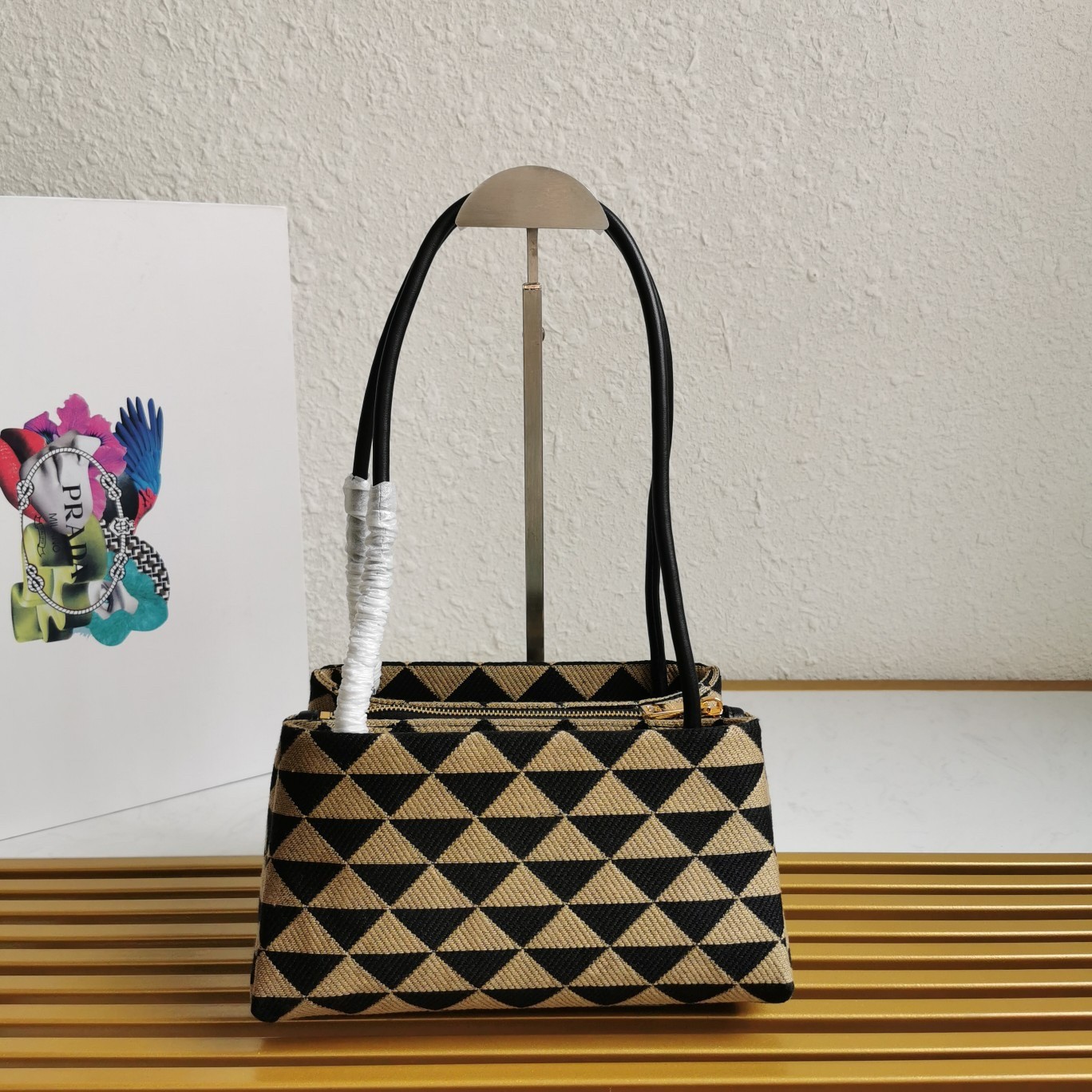 pra*a S*pernova small shoulder bag in black/beige fabric