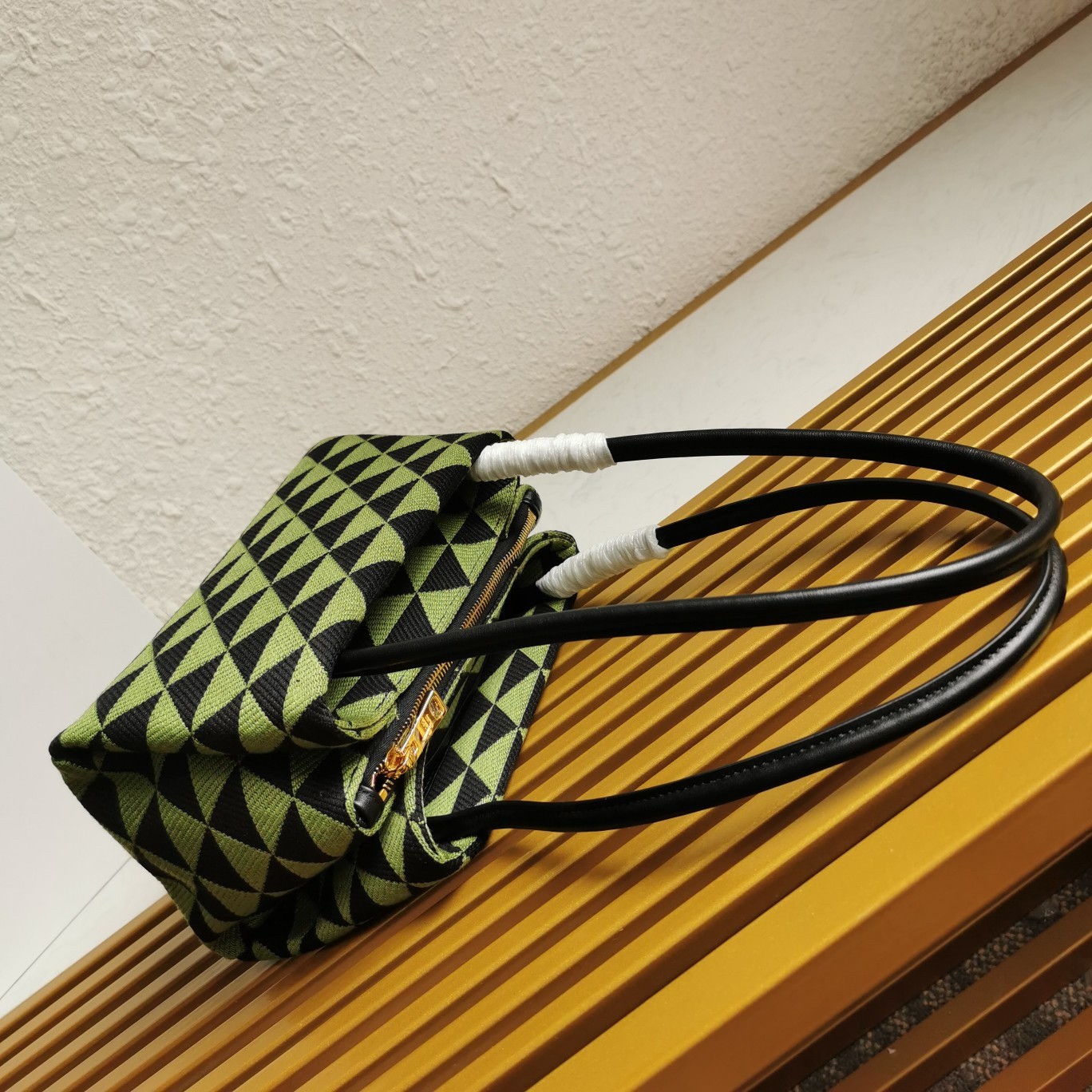 pra*a S*pernova small shoulder bag in black/green fabric
