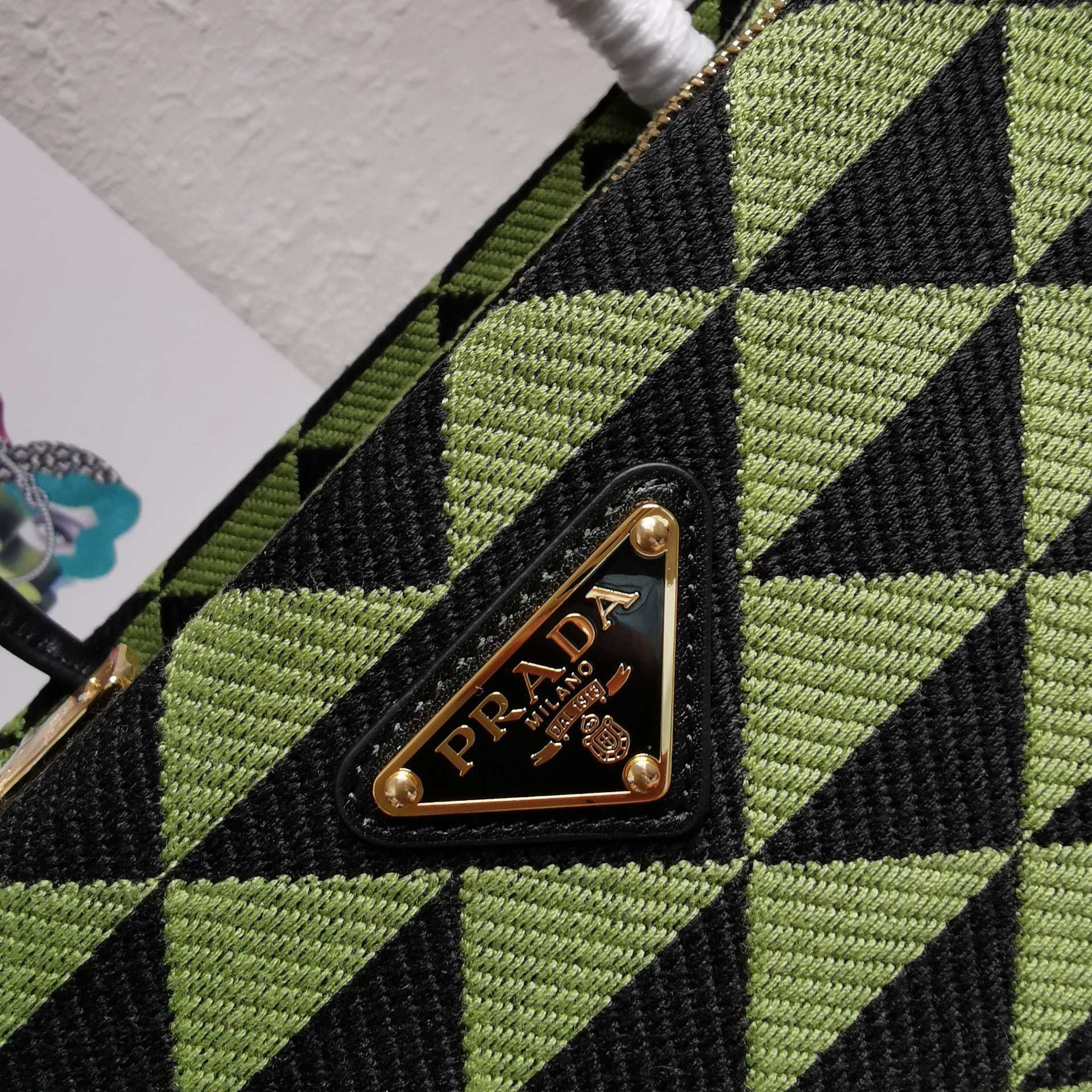 pra*a S*pernova small shoulder bag in black/green fabric