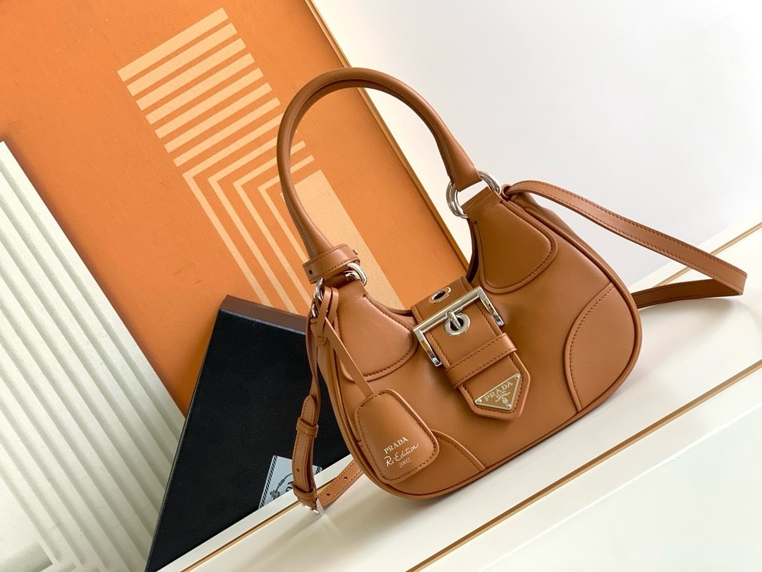 Pra*a moon bag in caramel padded nappa leather