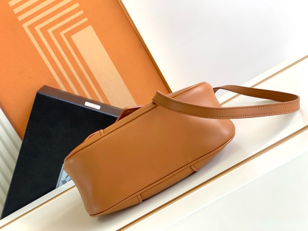 Pra*a moon bag in caramel padded nappa leather