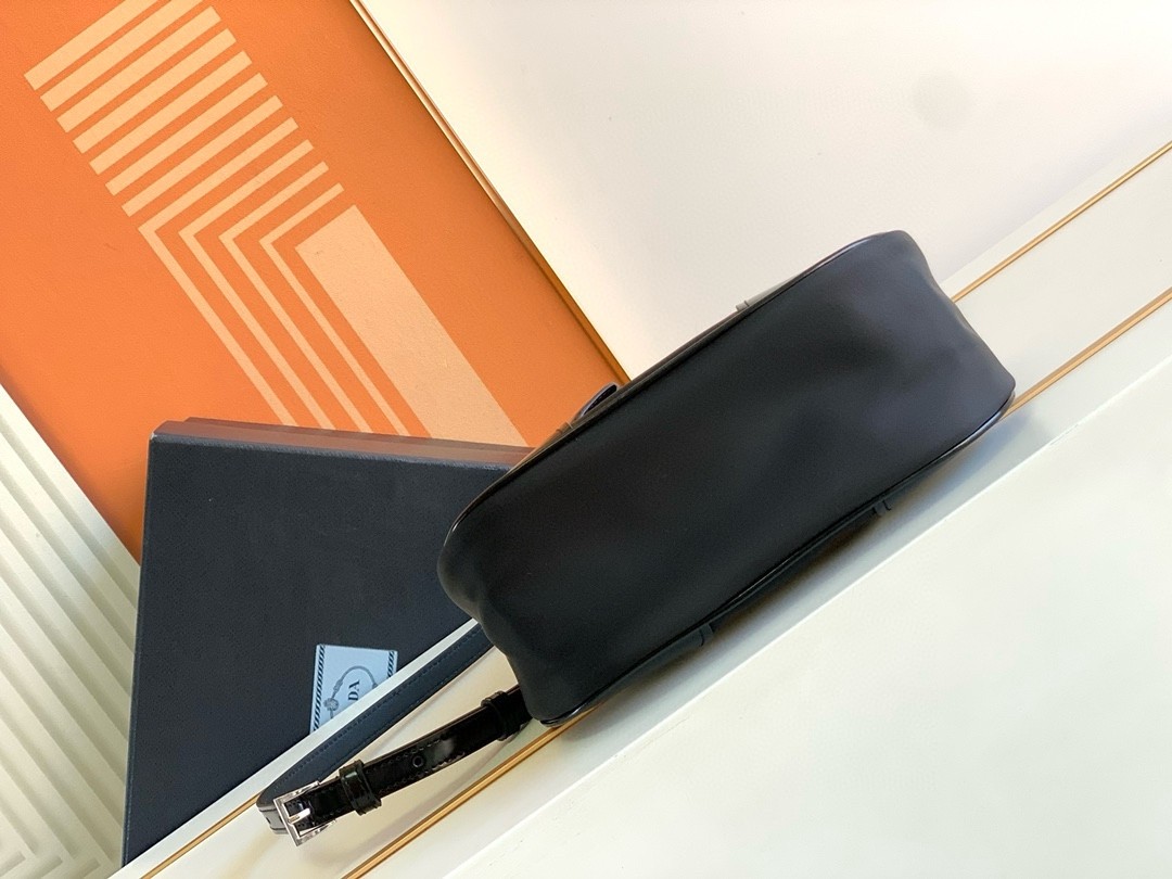 Pra*a moon bag in black padded nappa leather
