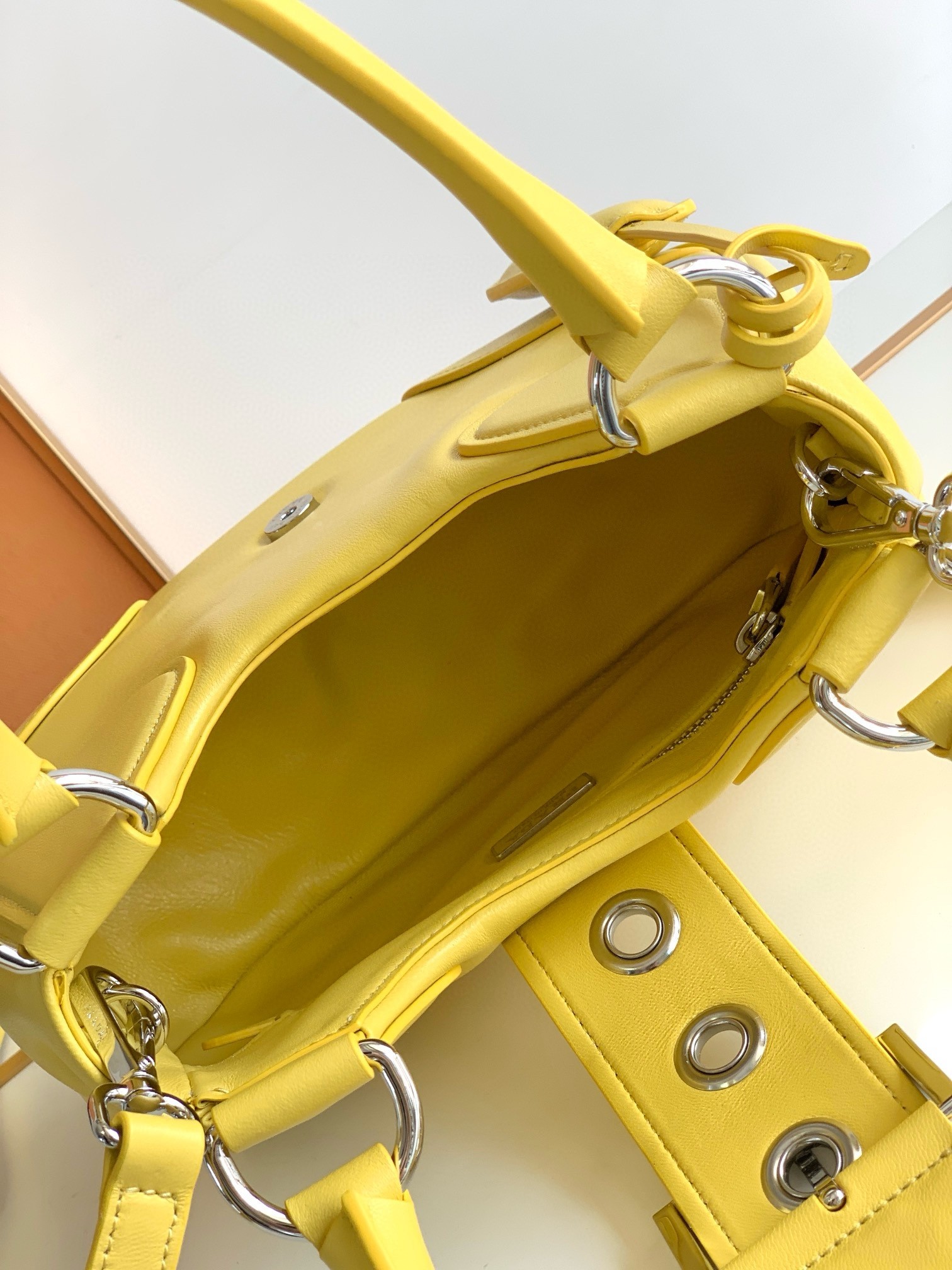 Pra*a moon bag in yellow padded nappa leather