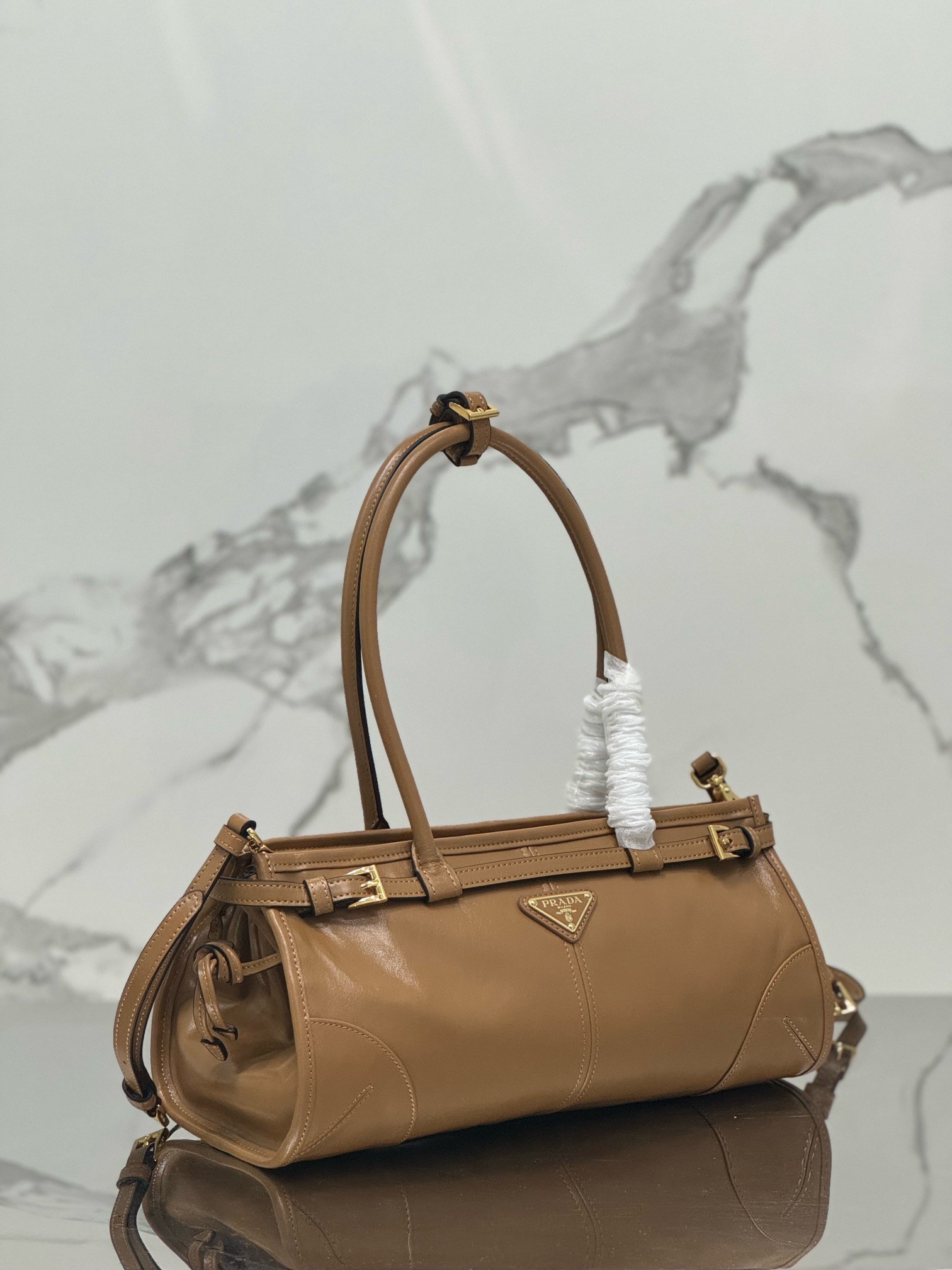 Pra*a medium tote bag in brown soft leather