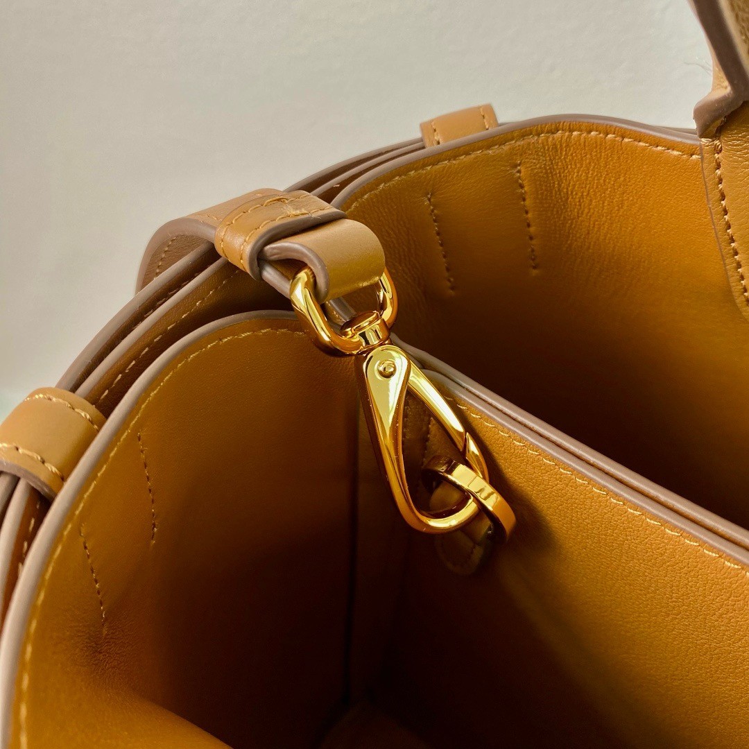 Pra*a buckle medium bag with belt in brown leather