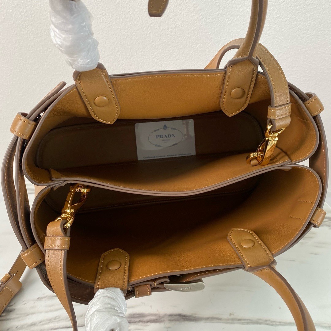 Pra*a buckle medium bag with belt in brown leather