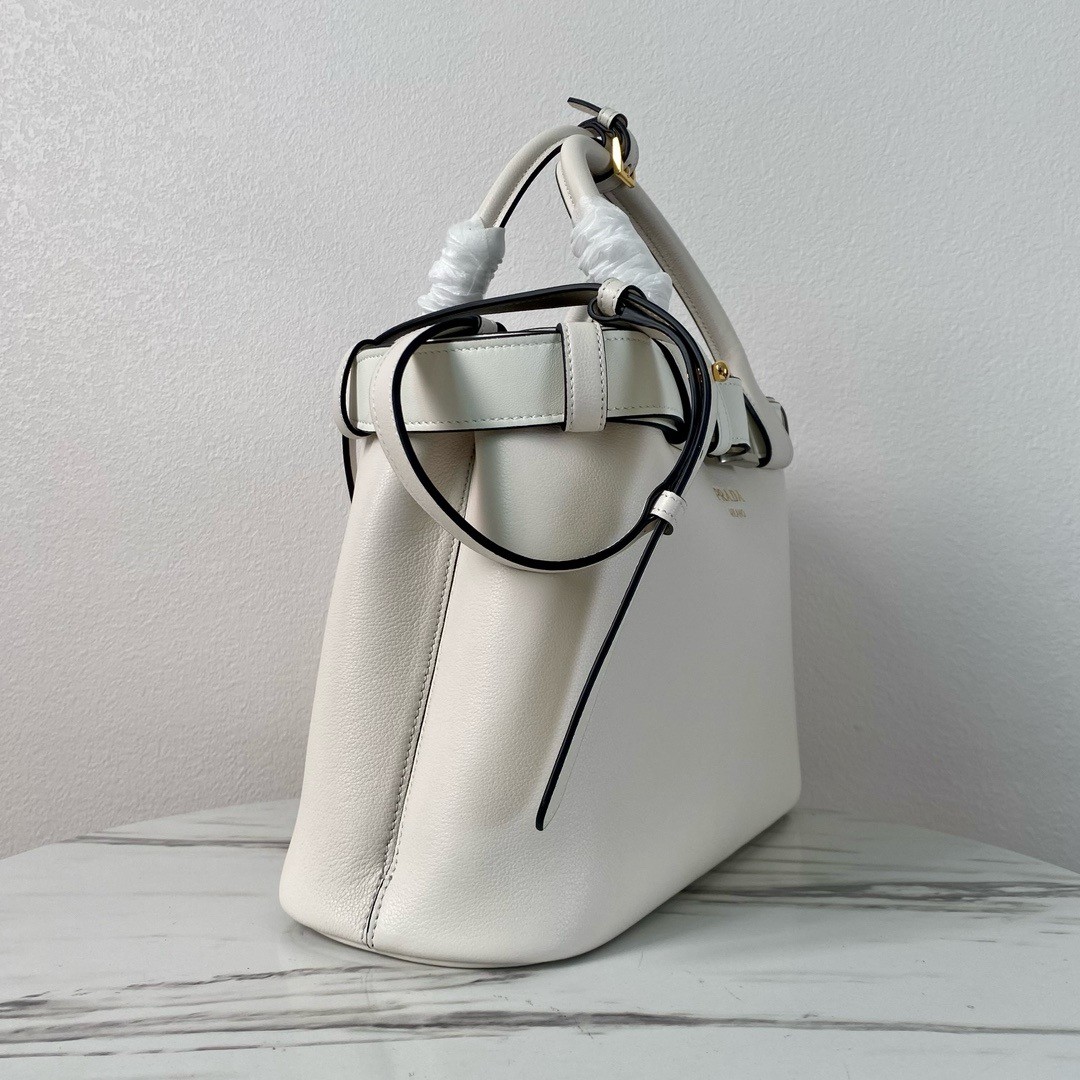 Pra*a buckle medium bag with belt in white leather