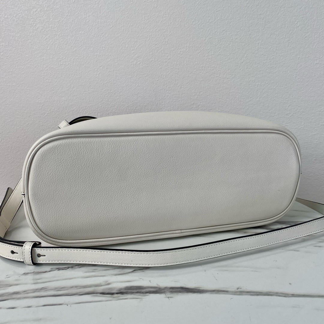 Pra*a buckle medium bag with belt in white leather