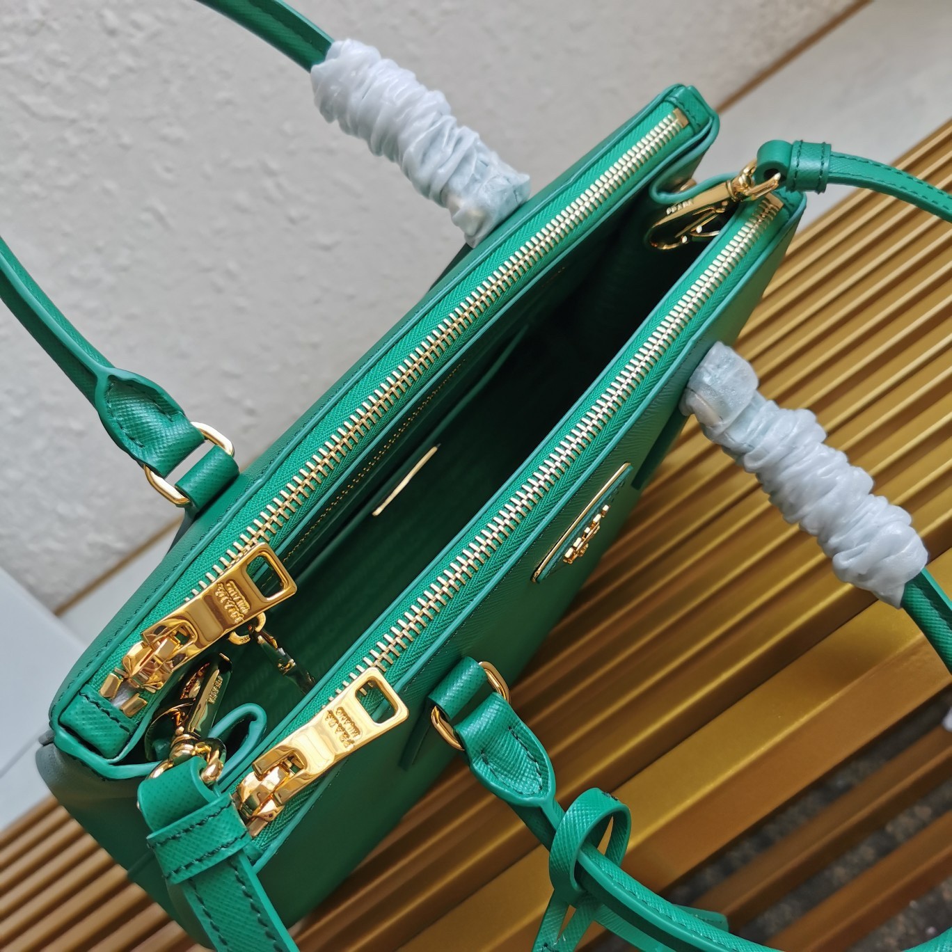 Pra*a small galleria bag in mango saffiano leather
