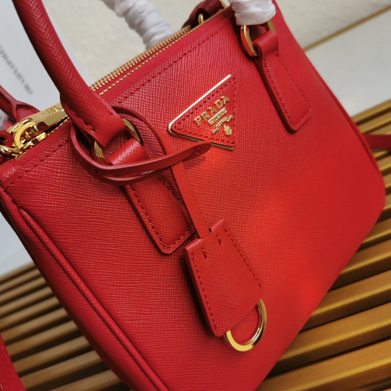Pra*a mini galleria bag in red saffiano leather