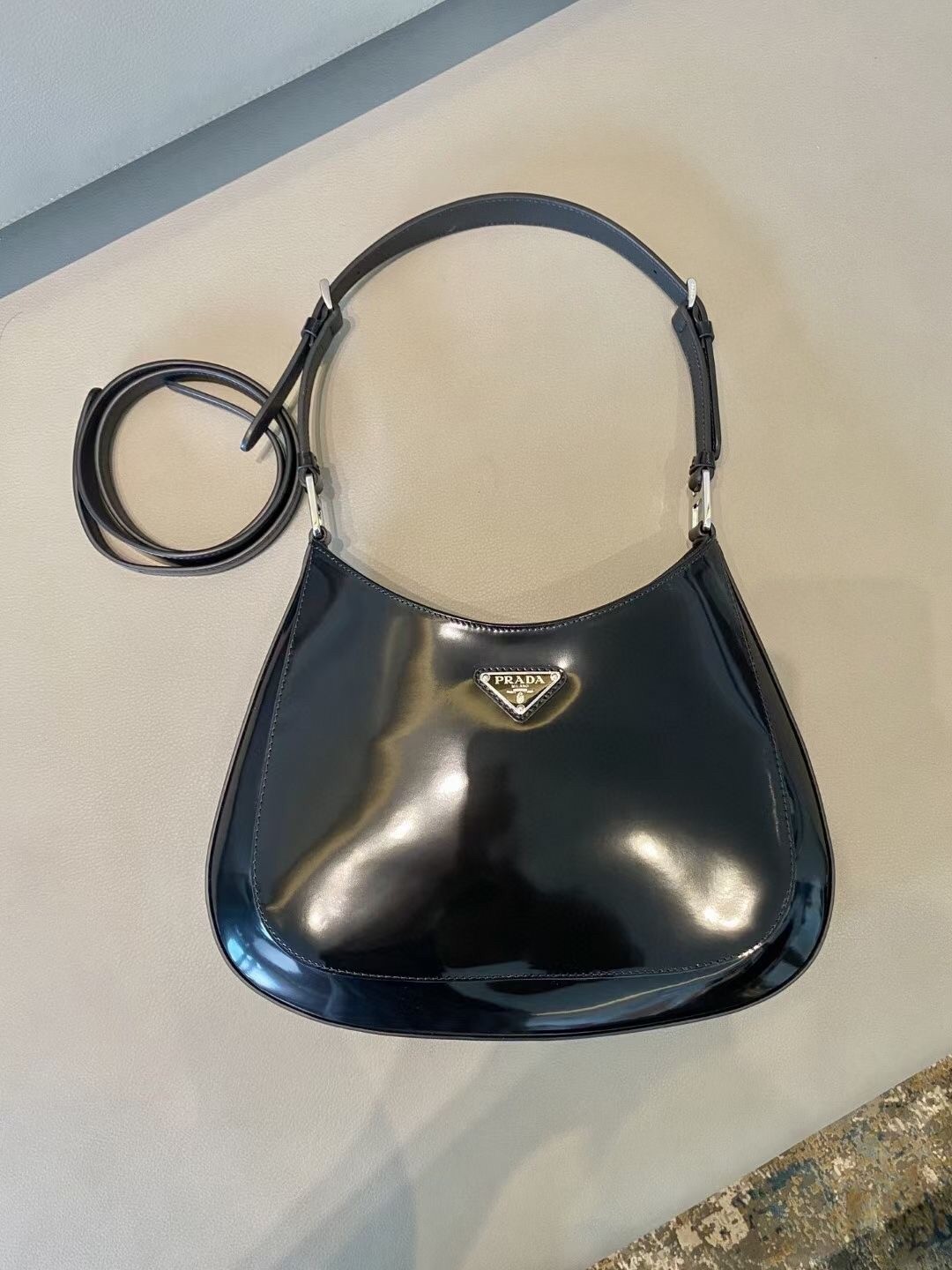 Pra*a cleo large shoulder bag in black brushed leather