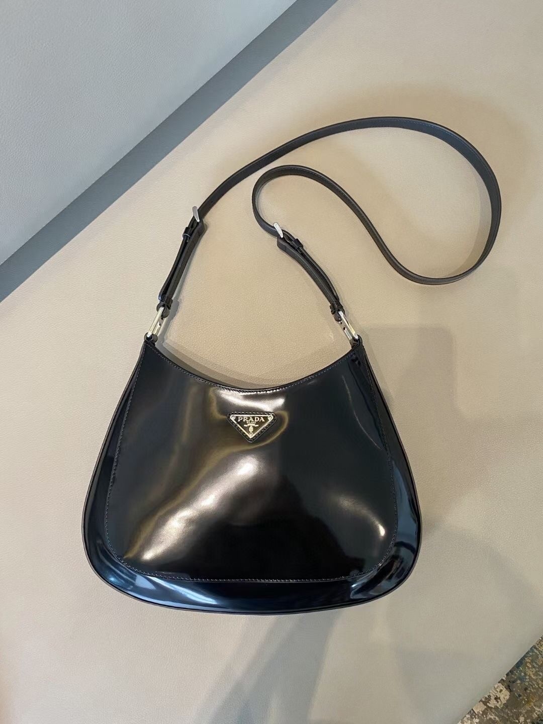 Pra*a cleo large shoulder bag in black brushed leather