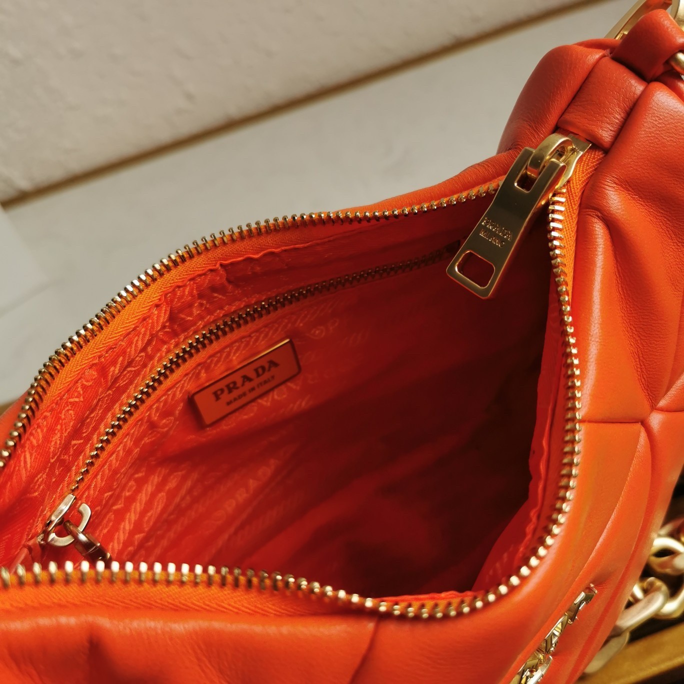 Pra*a system patchwork bag in orange nappa leather