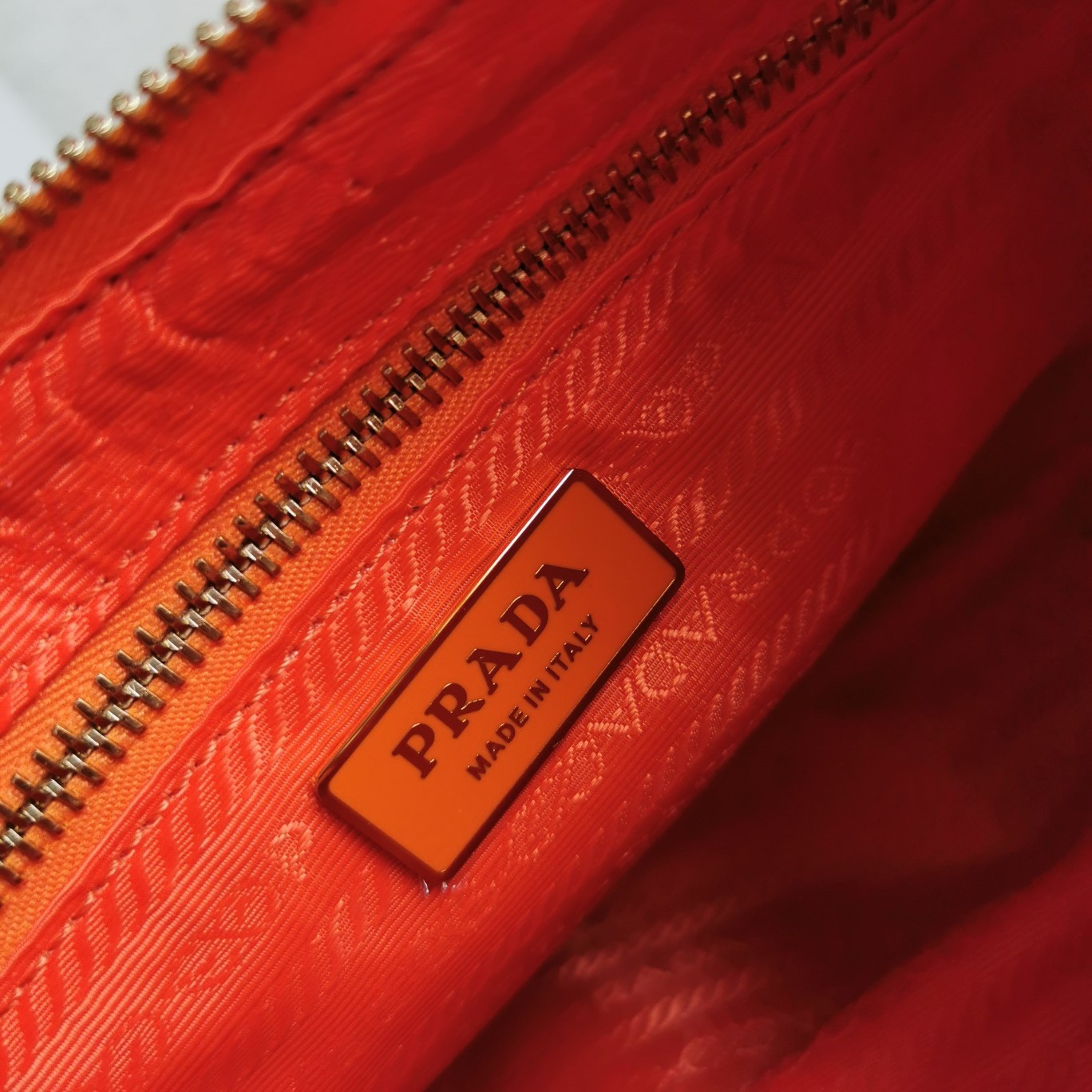 Pra*a system patchwork bag in orange nappa leather