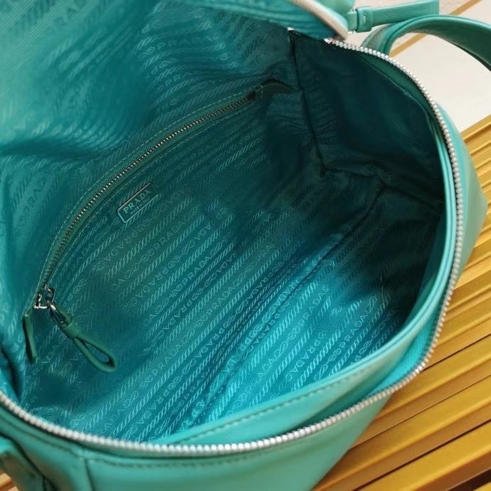 Pra*a signaux bag in peacock blue padded nappa leather