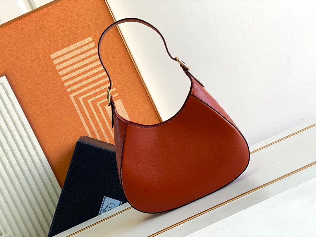 Pra*a shoulder bag in berry leather