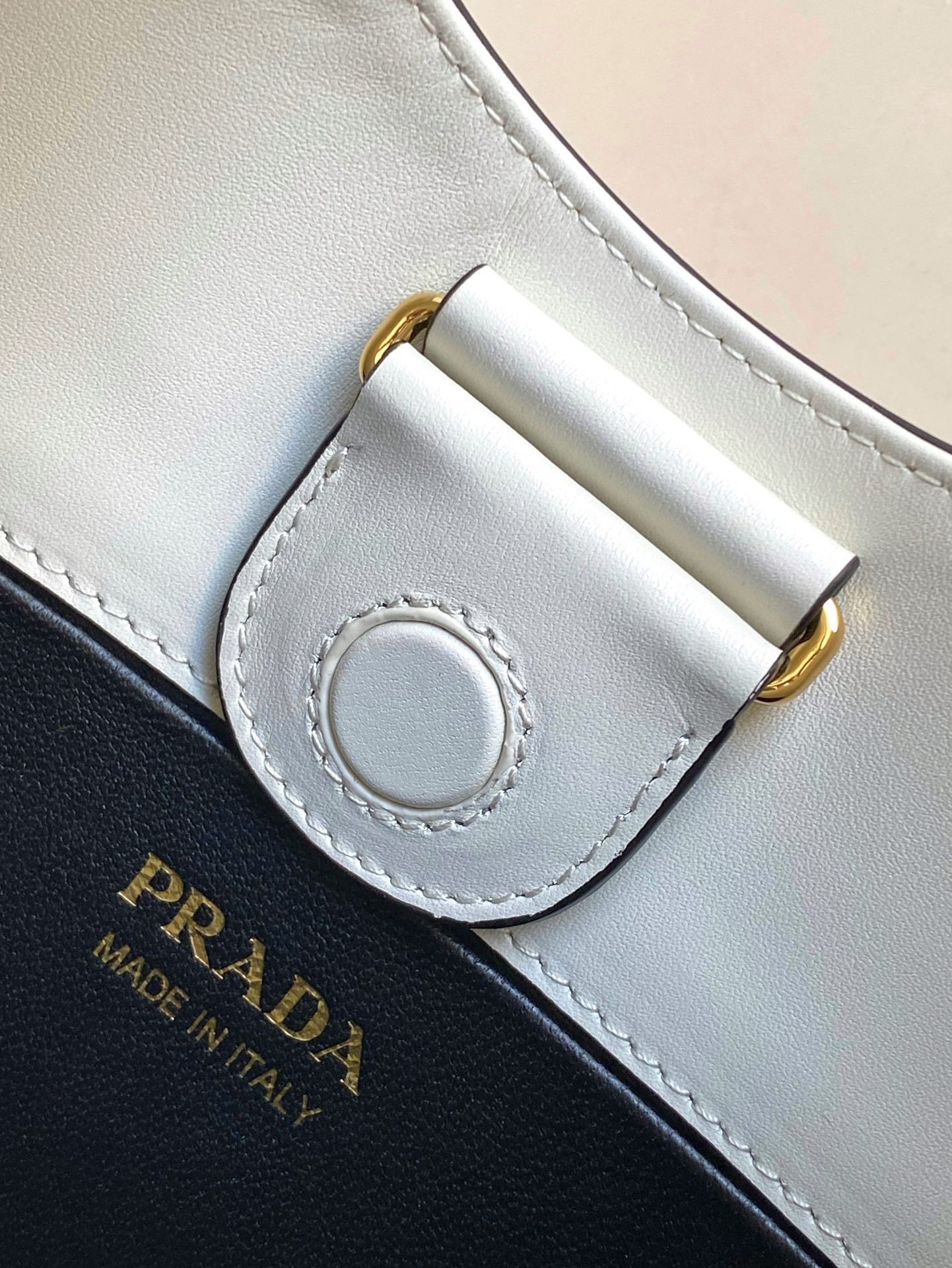 Pra*a shoulder bag in white leather
