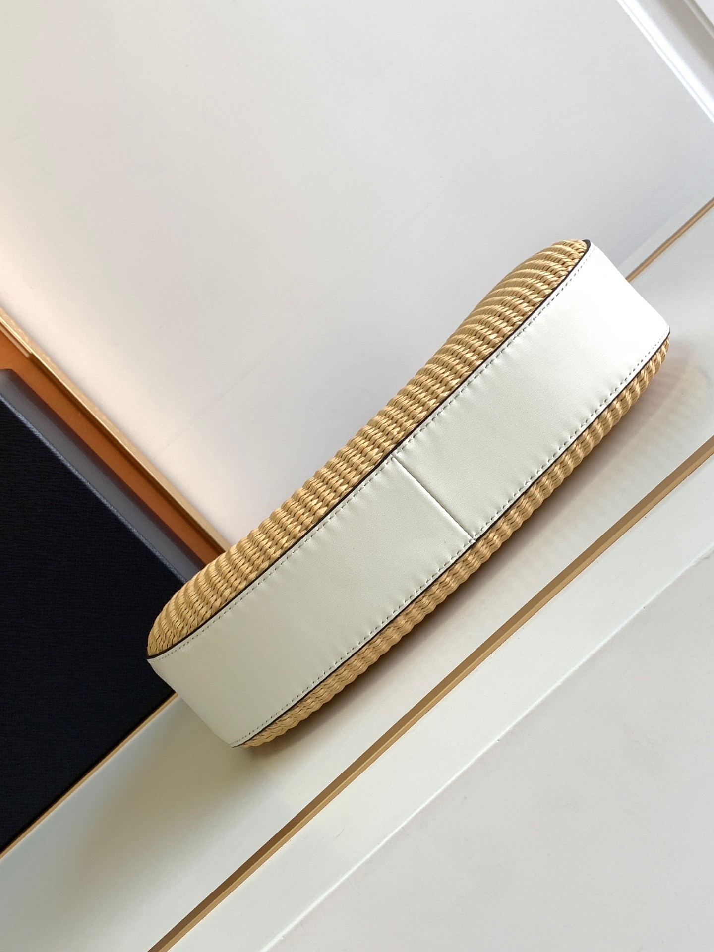 Pra*a shoulder bag in woven straw and white leather