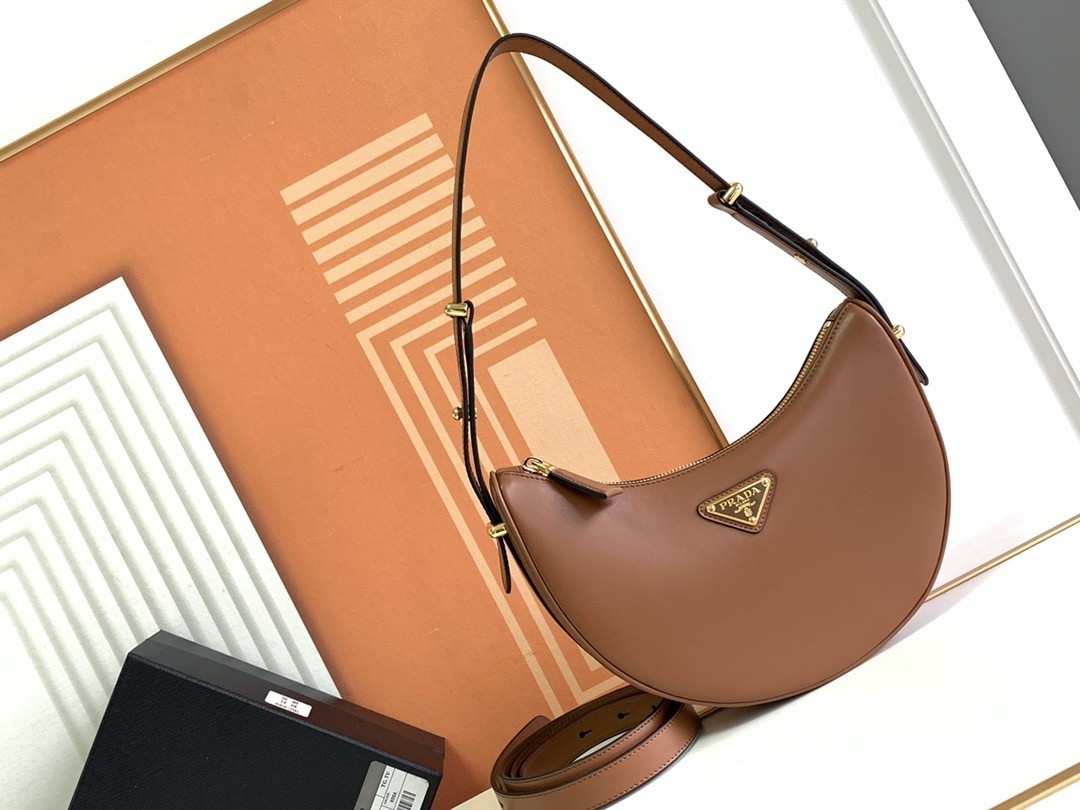 Pra*a arque shoulder bag in brown leather
