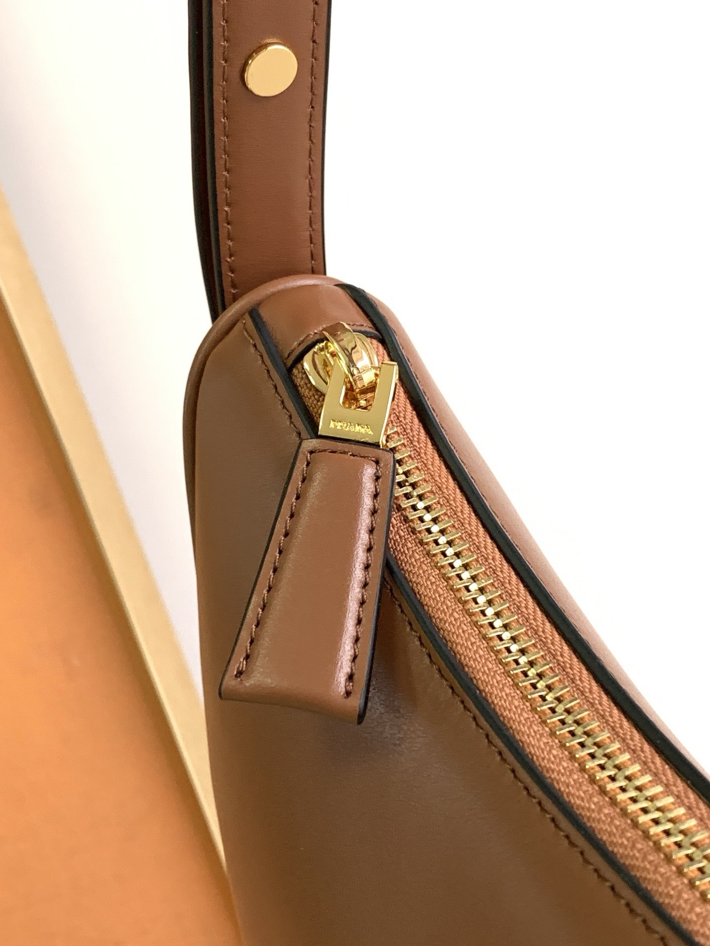 Pra*a arque shoulder bag in brown leather