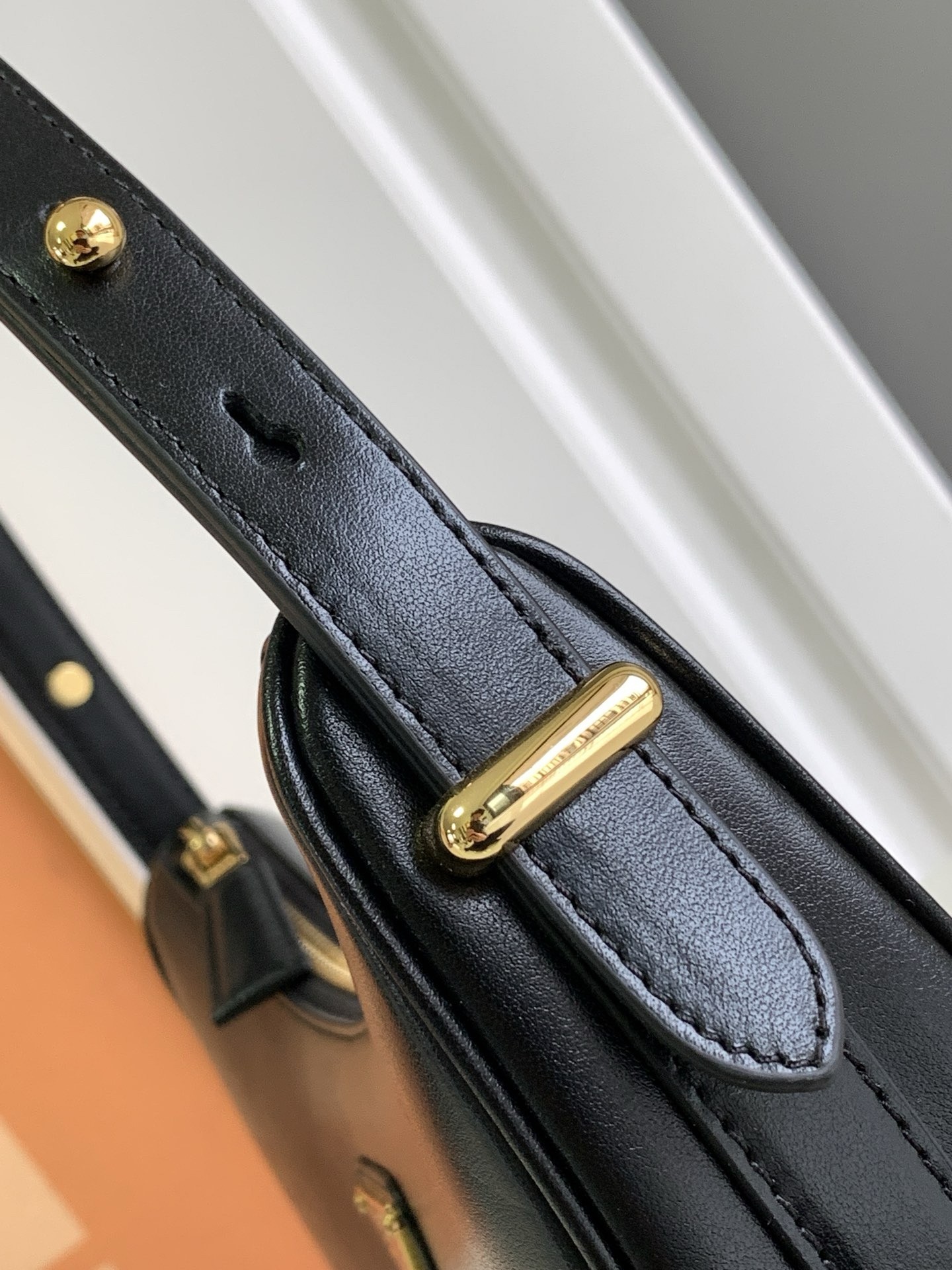 Pra*a arque shoulder bag in black leather