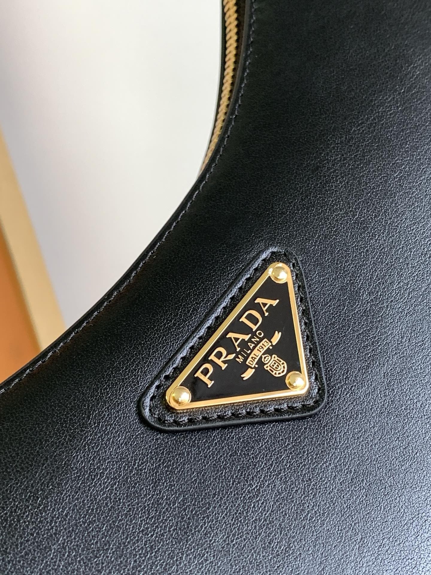 Pra*a arque shoulder bag in black leather