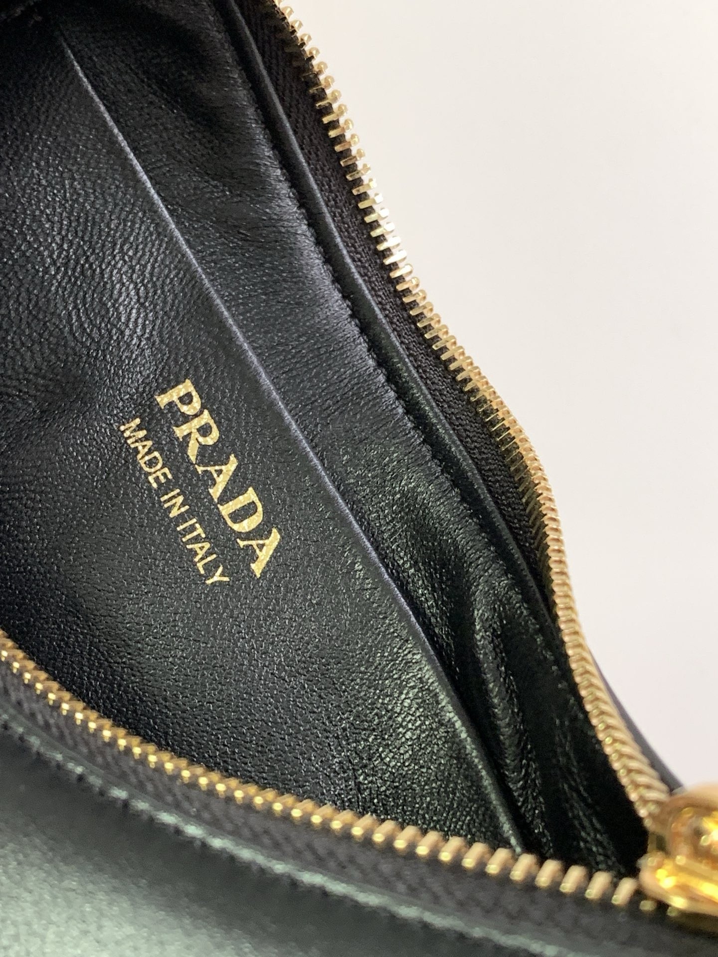 Pra*a arque shoulder bag in black leather