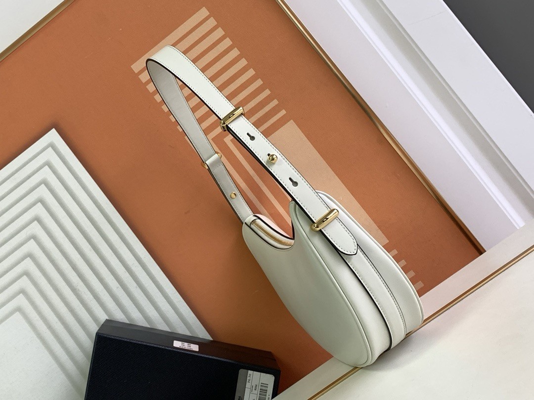 Pra*a arque shoulder bag in white leather